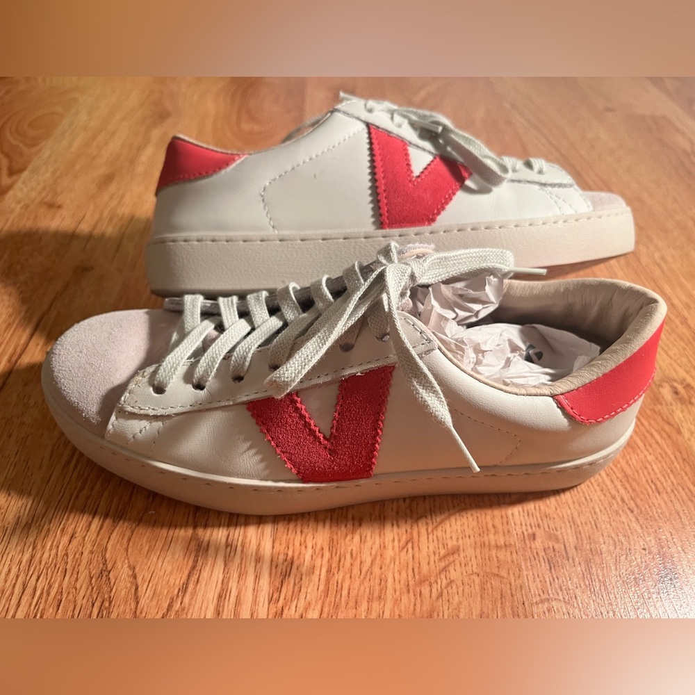 White Sneakers with Red Accents